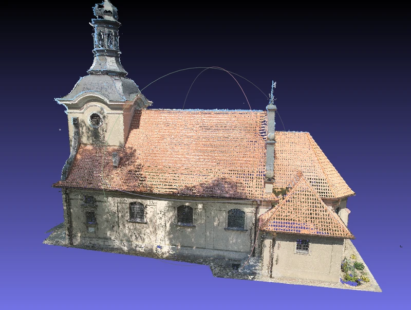 Widok fotogrametrycznego odwzorowania budynku z dachem i wieżą.